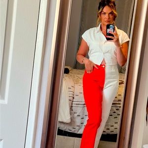 Half orange half off white Jeans.